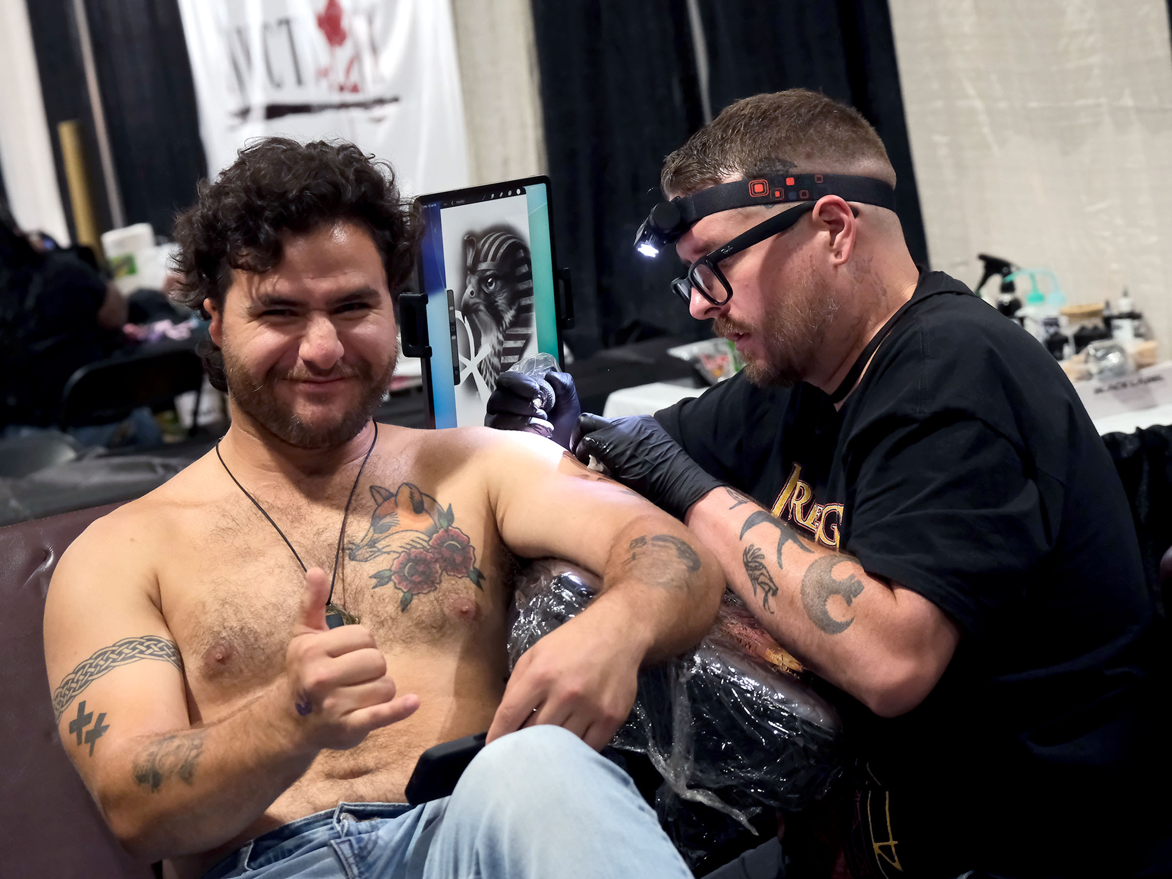 Tattoo artist at Long Beach Tattoo Arts Festival 2026 at the Long Beach Entertainment Center.