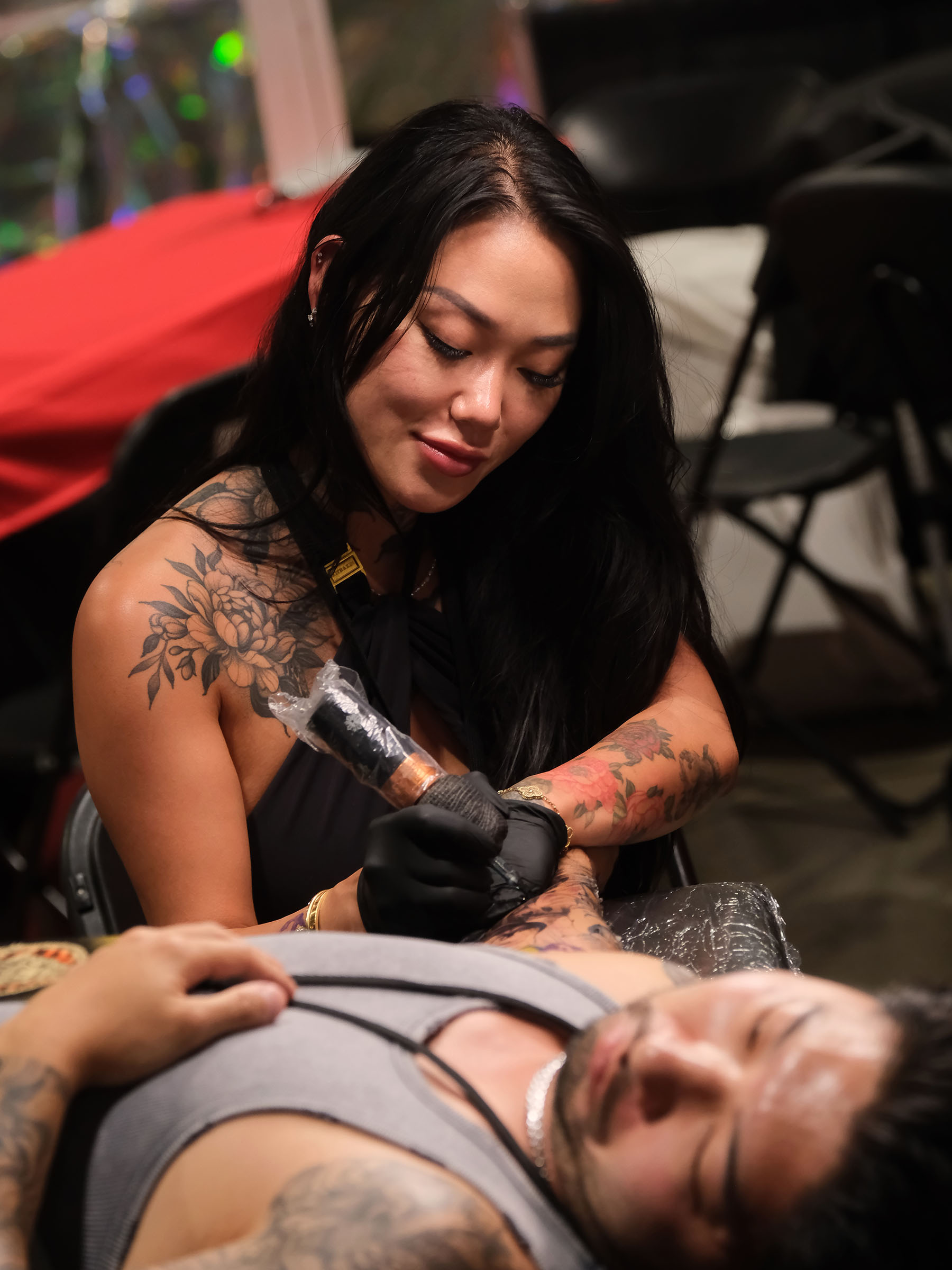 Tattoo artist at Long Beach Tattoo Arts Festival 2026 at the Long Beach Entertainment Center.