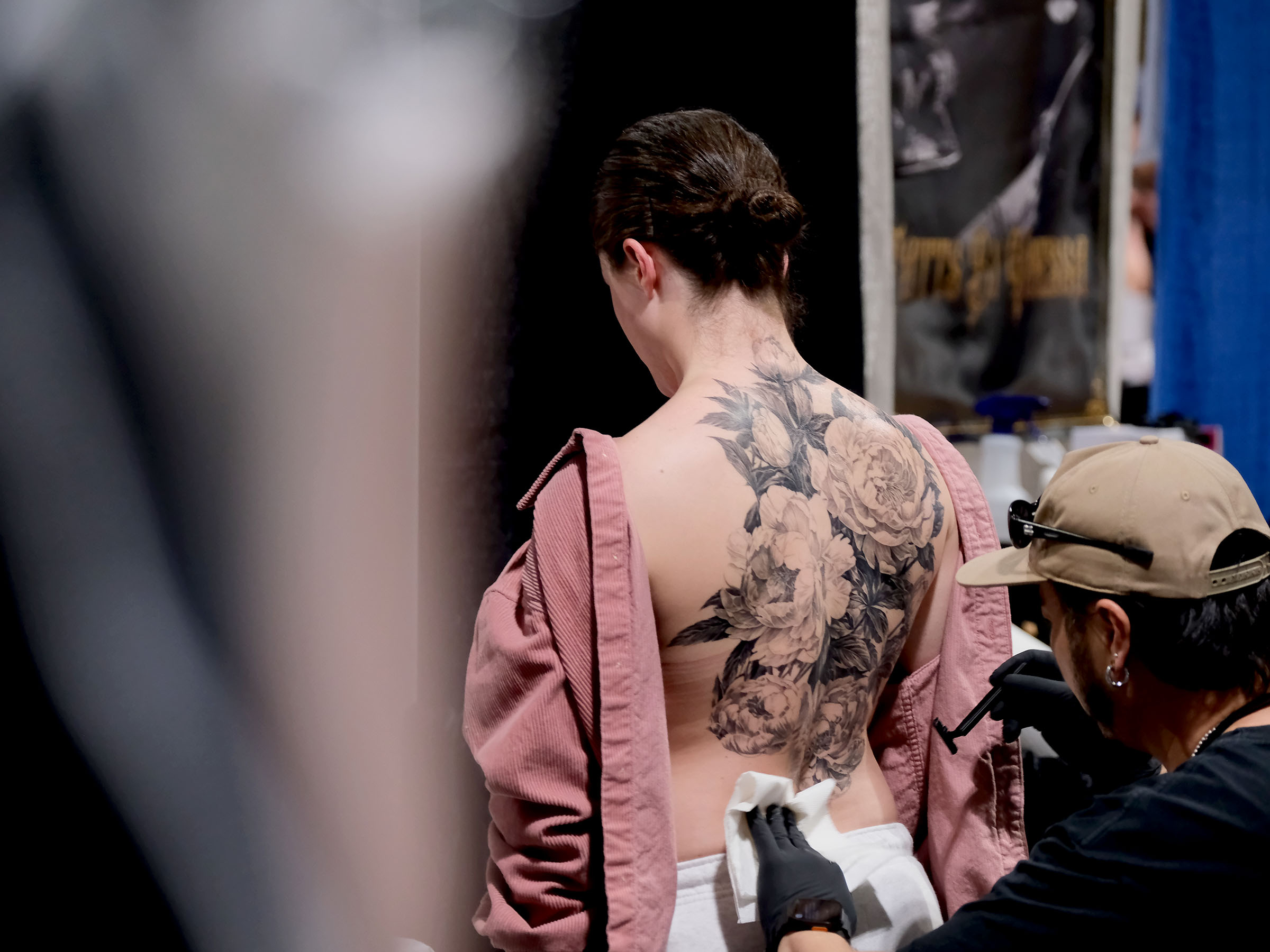 Tattoo artist at Long Beach Tattoo Arts Festival 2026 at the Long Beach Entertainment Center.