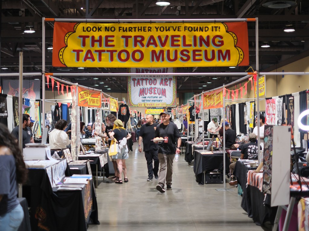 Tattoo artist at Long Beach Tattoo Arts Festival 2026 at the Long Beach Entertainment Center.