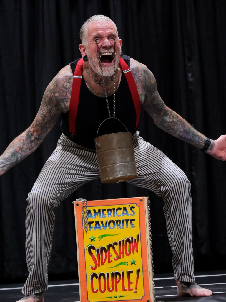Tattoo artist at Long Beach Tattoo Arts Festival 2026 at the Long Beach Entertainment Center.
