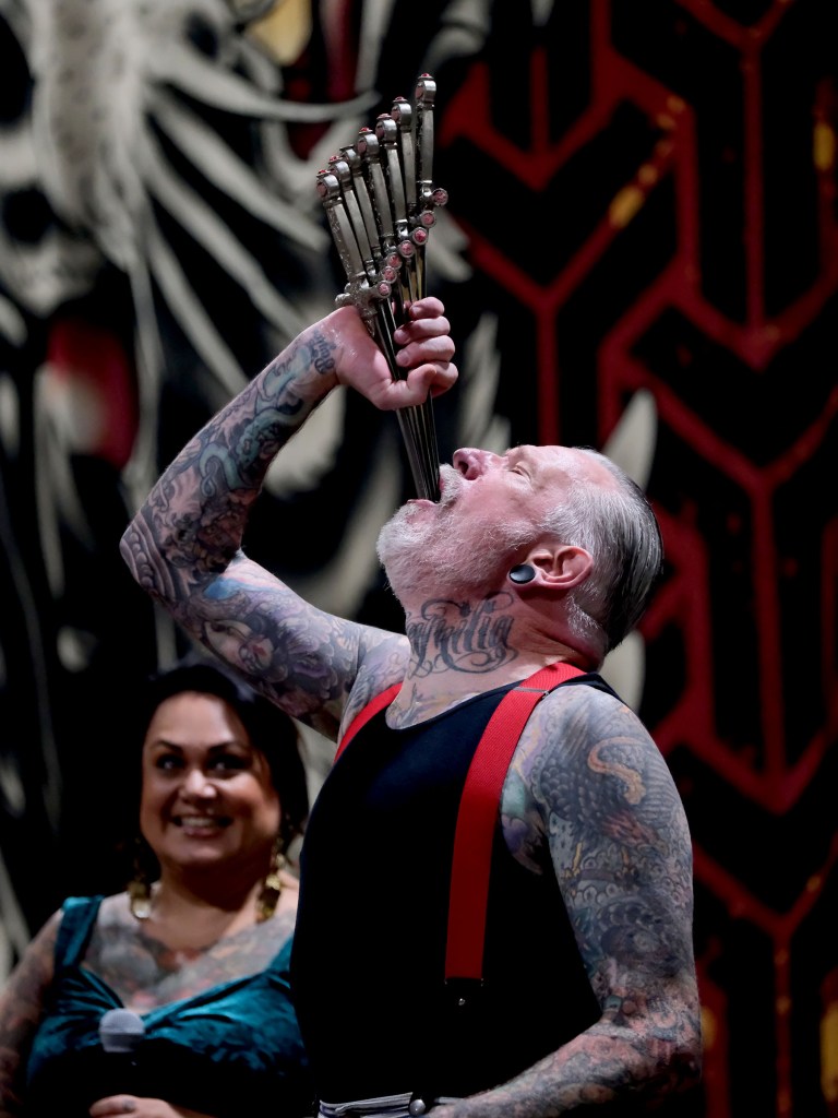 Tattoo artist at Long Beach Tattoo Arts Festival 2026 at the Long Beach Entertainment Center.