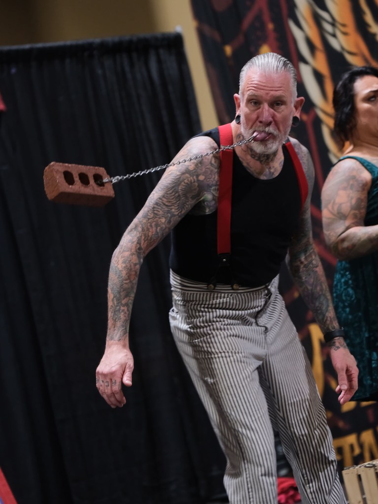 Tattoo artist at Long Beach Tattoo Arts Festival 2026 at the Long Beach Entertainment Center.