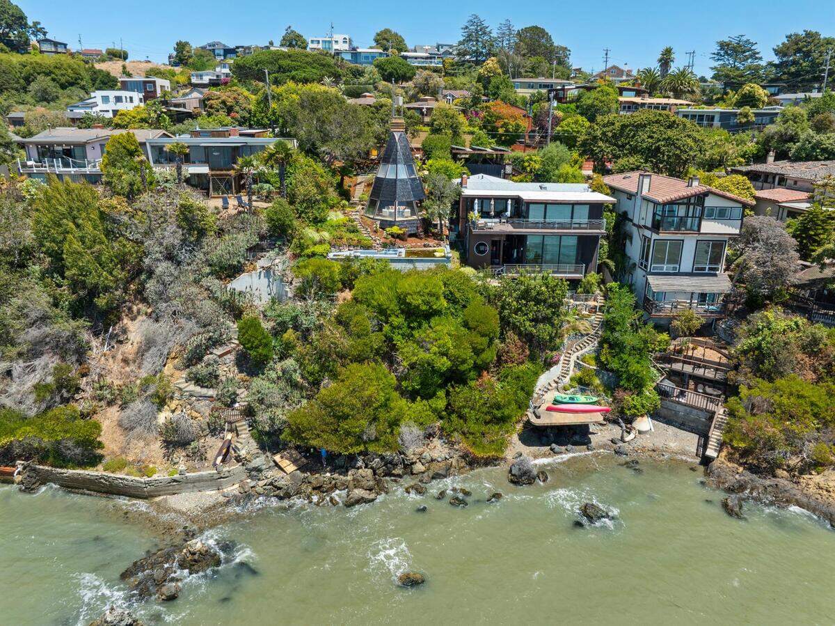 The Lumiere House, a conical waterfront home in Point Richmond, Calif., is seen from the San Francisco Bay. The architect-designed house at 331 Wester Drive is listed for $899,000.
