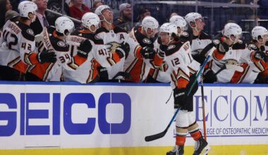 Dec 7, 2021; Buffalo, New York, USA;  Anaheim Ducks left wing Sonny Milano (12) celebrates his goal with teammates during the second period against the Buffalo Sabres at KeyBank Center. Mandatory Credit: Timothy T. Ludwig-USA TODAY Sports