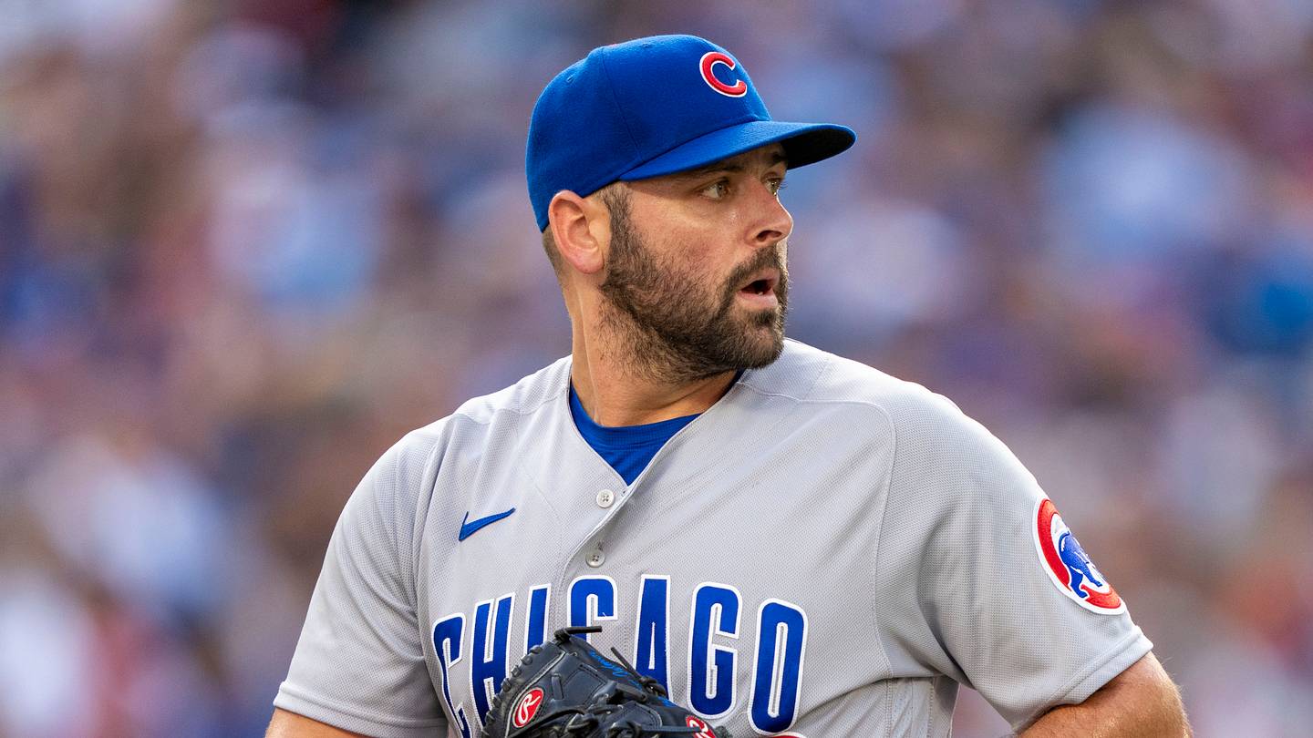 Chicago Cubs relief pitcher Michael Fulmer (32) looks on