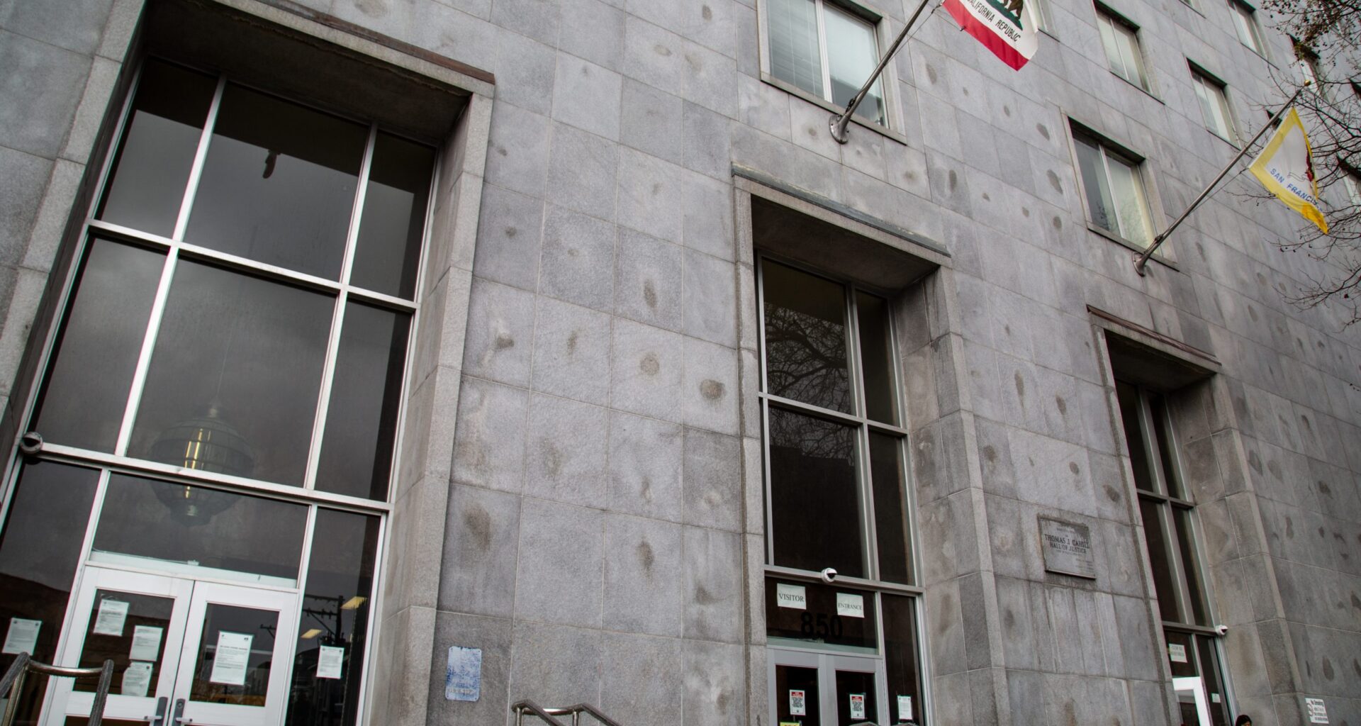 S.F. shelter worker, charged with aiding alleged cop shooter, intercepted by feds on courthouse steps