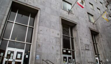 S.F. shelter worker, charged with aiding alleged cop shooter, intercepted by feds on courthouse steps