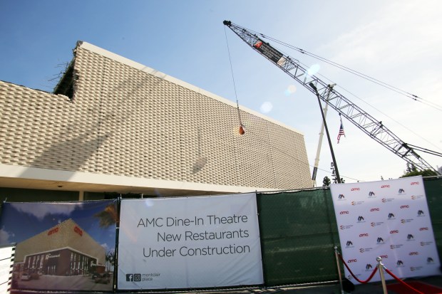 A wrecking ball is ready for the demolition ceremony of the old Broadway building on the east side of the Montclair Place mall to make way for a new two-level entertainment and dining building that will feature an AMC Dine-In Theatre, at the Montclair Place in Montclair, CA., Tuesday, April 10. The 12-Screen AMC Theatre will be constructed on the upper level of the new building, occupying 55,000 square feet while 64,000 square feet of space on the lower level will be comprised of the new restaurant and entertainment concepts. (Photo by James Carbone for the Inland Valley Daily Bulletin)