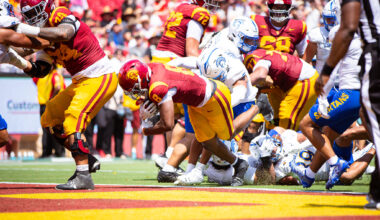 King Miller pushes into the end zone