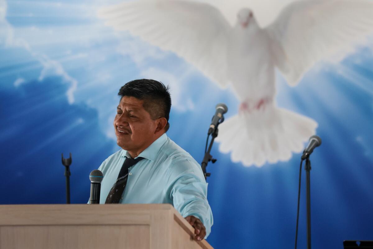 Pastor Juan Galicia delivers a sermon at the Ministerio Esperanza Church in Los Angeles, CA.