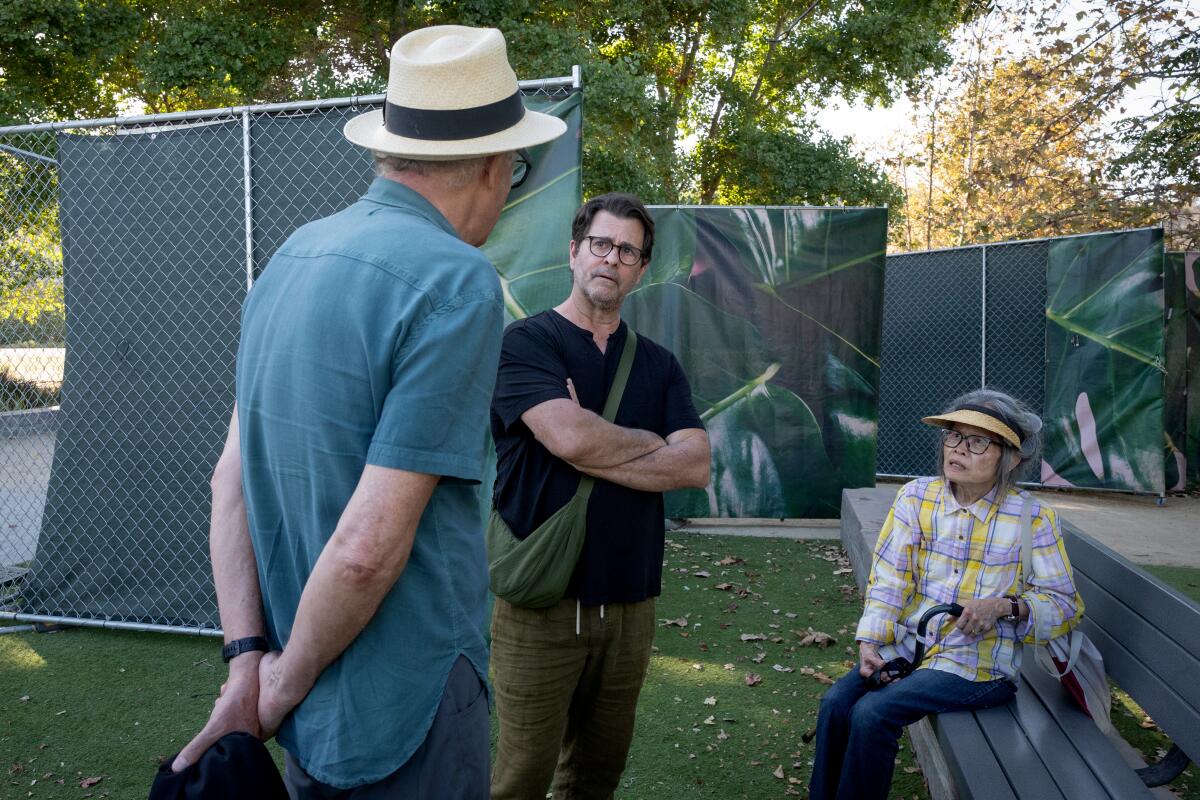 Jon Christensen, Sean Woods and Susan Lai chat at Los Angeles State Historic Park.