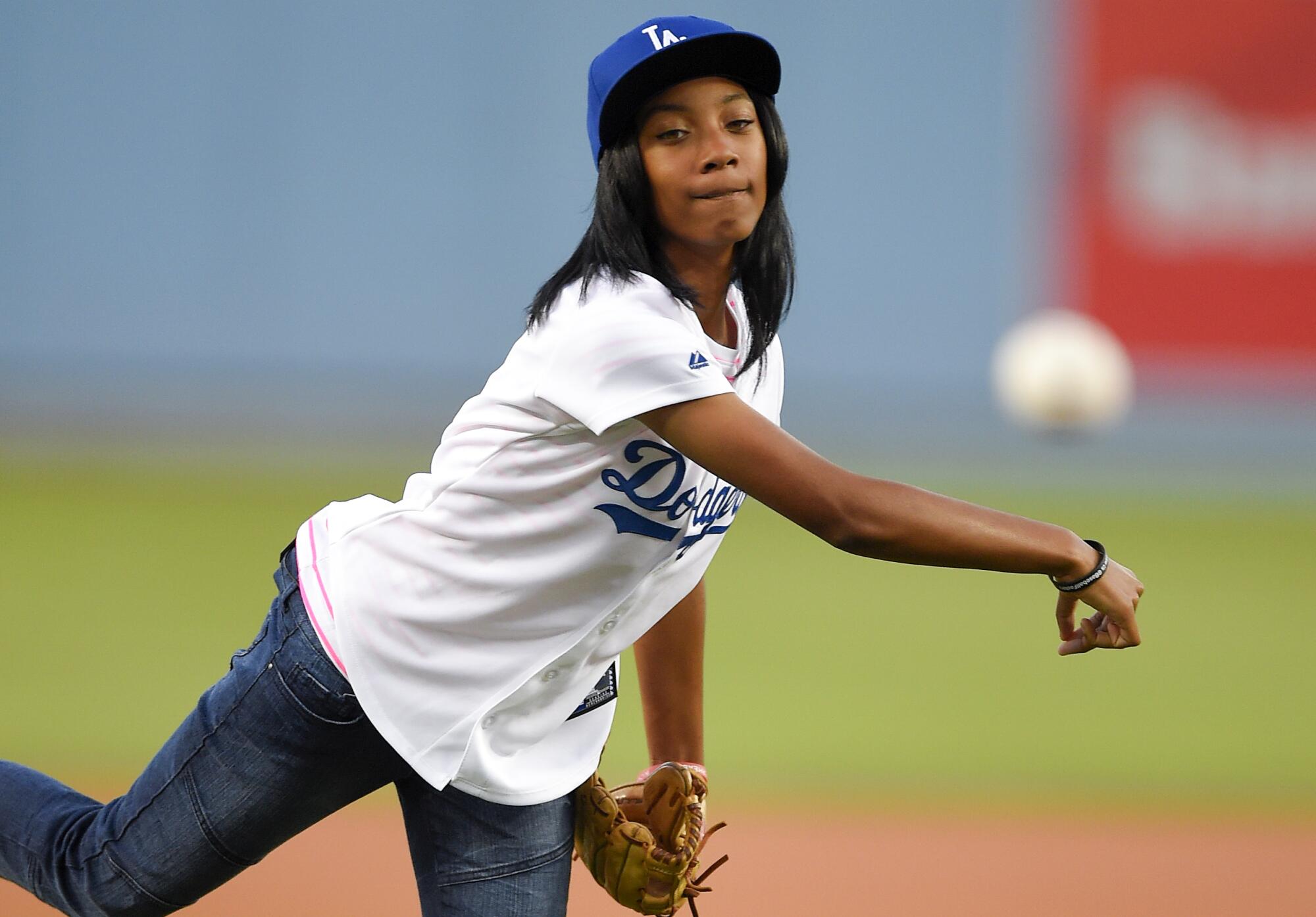 Mo'ne Davis throws out the ceremonial first pitch prior to a Dodgers game on Nov. 17, 2014.