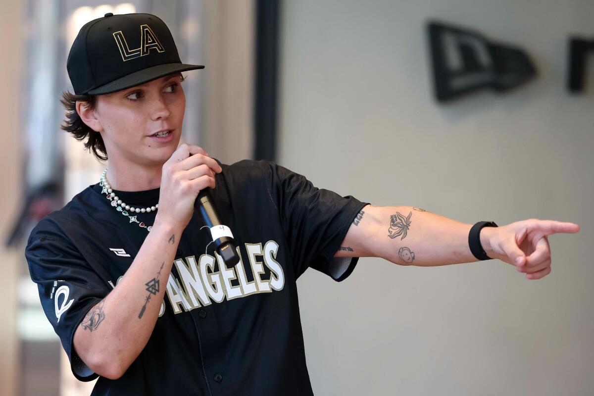 The Los Angeles Queens' Ashton Lansdell speaks at the Women's Professional Baseball League team name and jersey reveal.