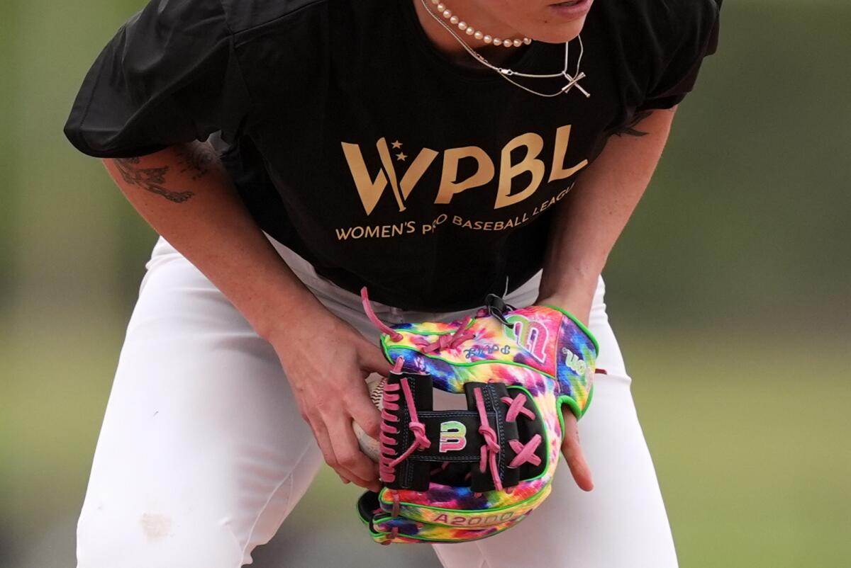 Ashton Lansdell fields a hit during a Women's Pro Baseball League on March 18 in Fort Myers, Fla. 
