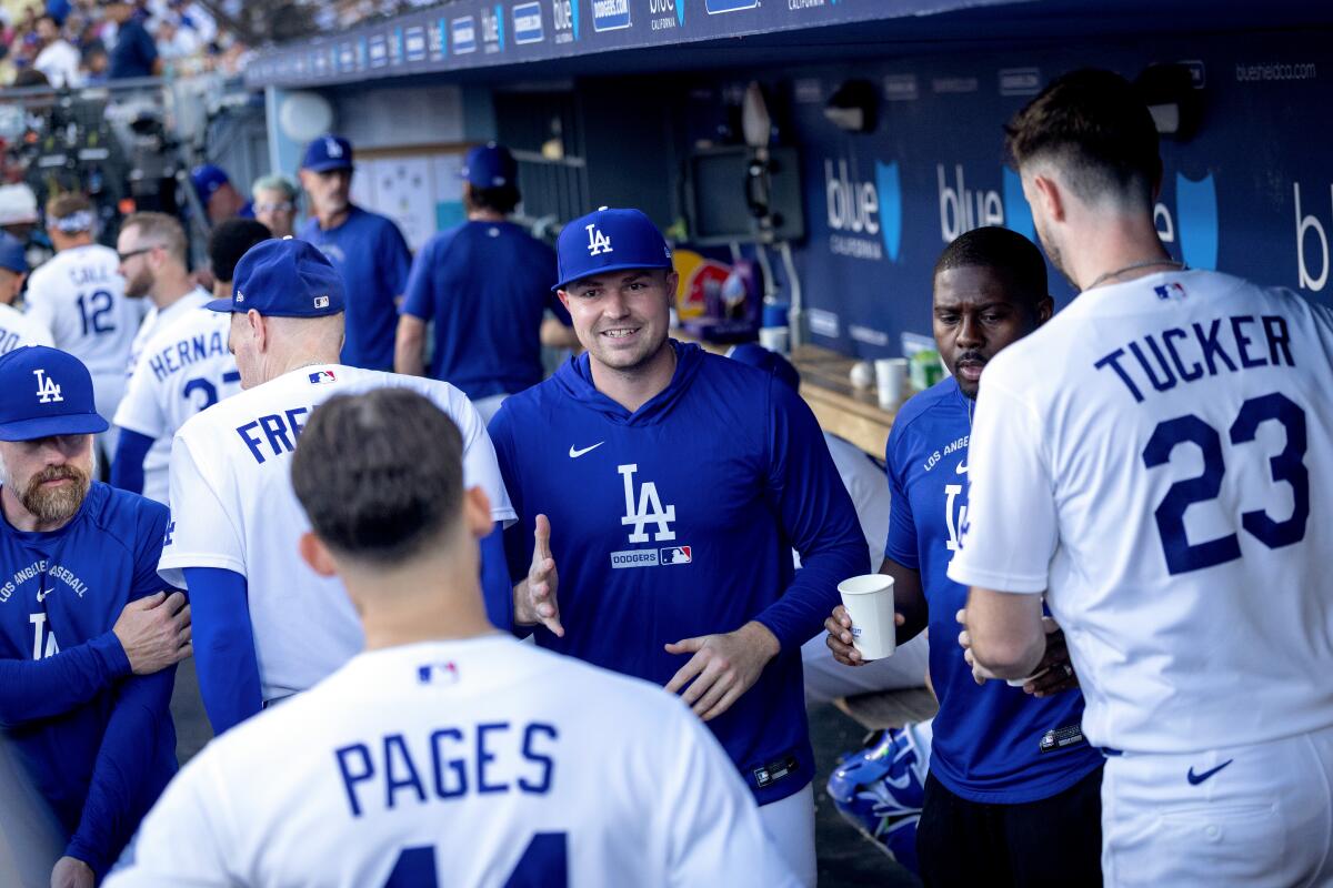 Newly acquired Dodgers pitcher Tarik Skubal greets center fielder Andy Pages.