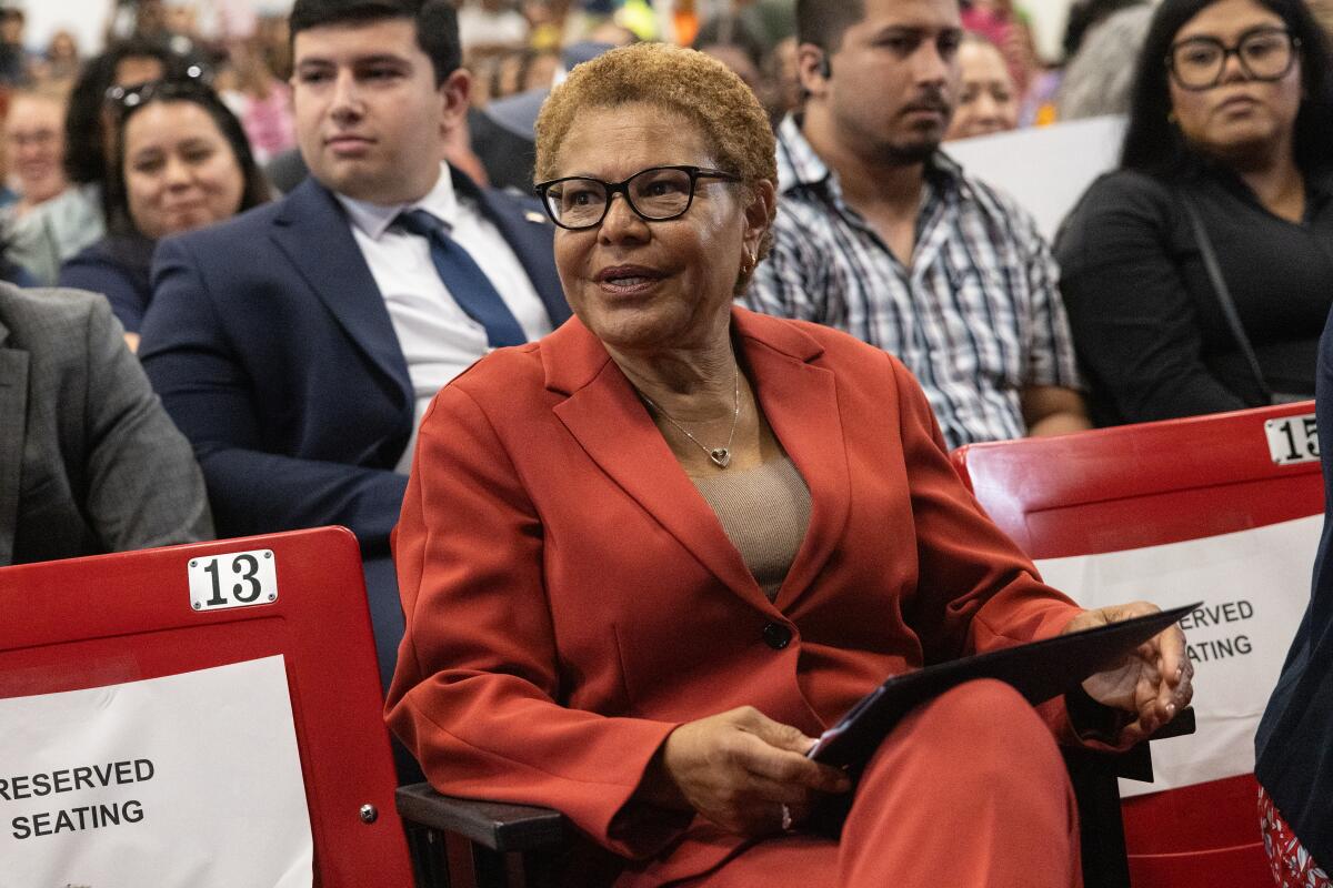 Los Angeles Mayor Karen Bass reacts as she is booed 