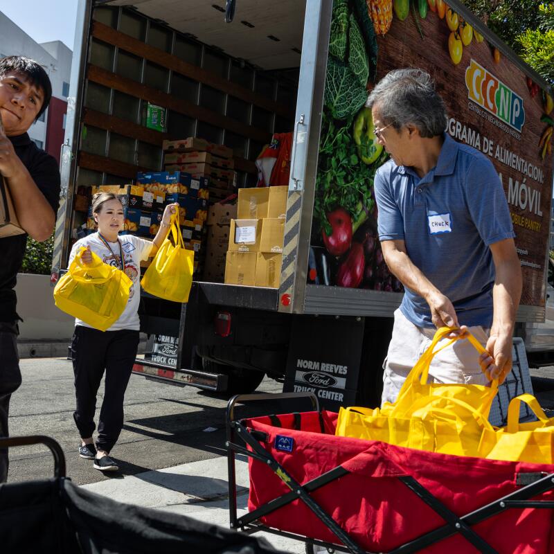 Food is distributed to Chinatown residents living in single-room occupancy hotels, or SROs.