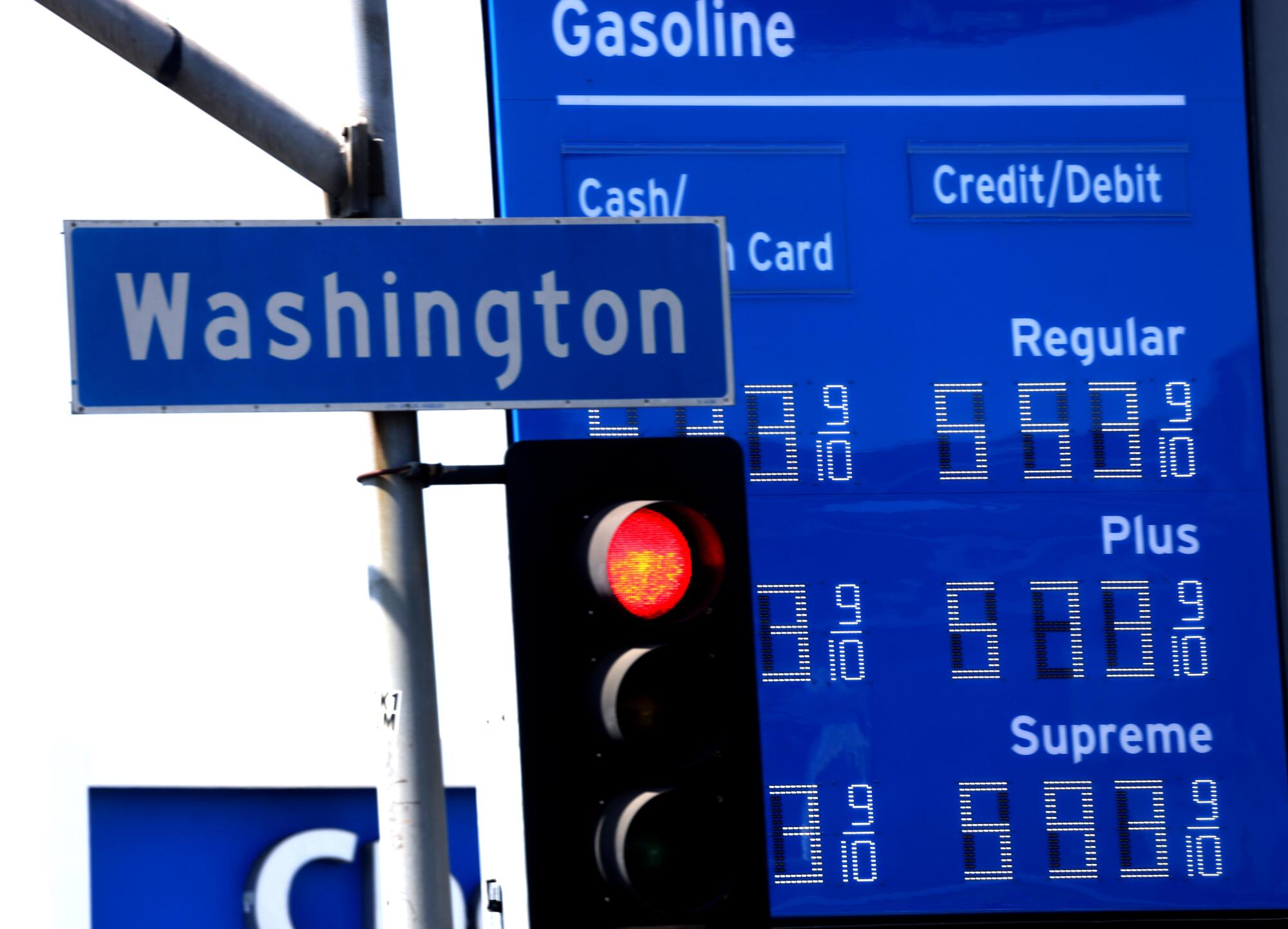Gas are presented on a marquee at a Chevron station