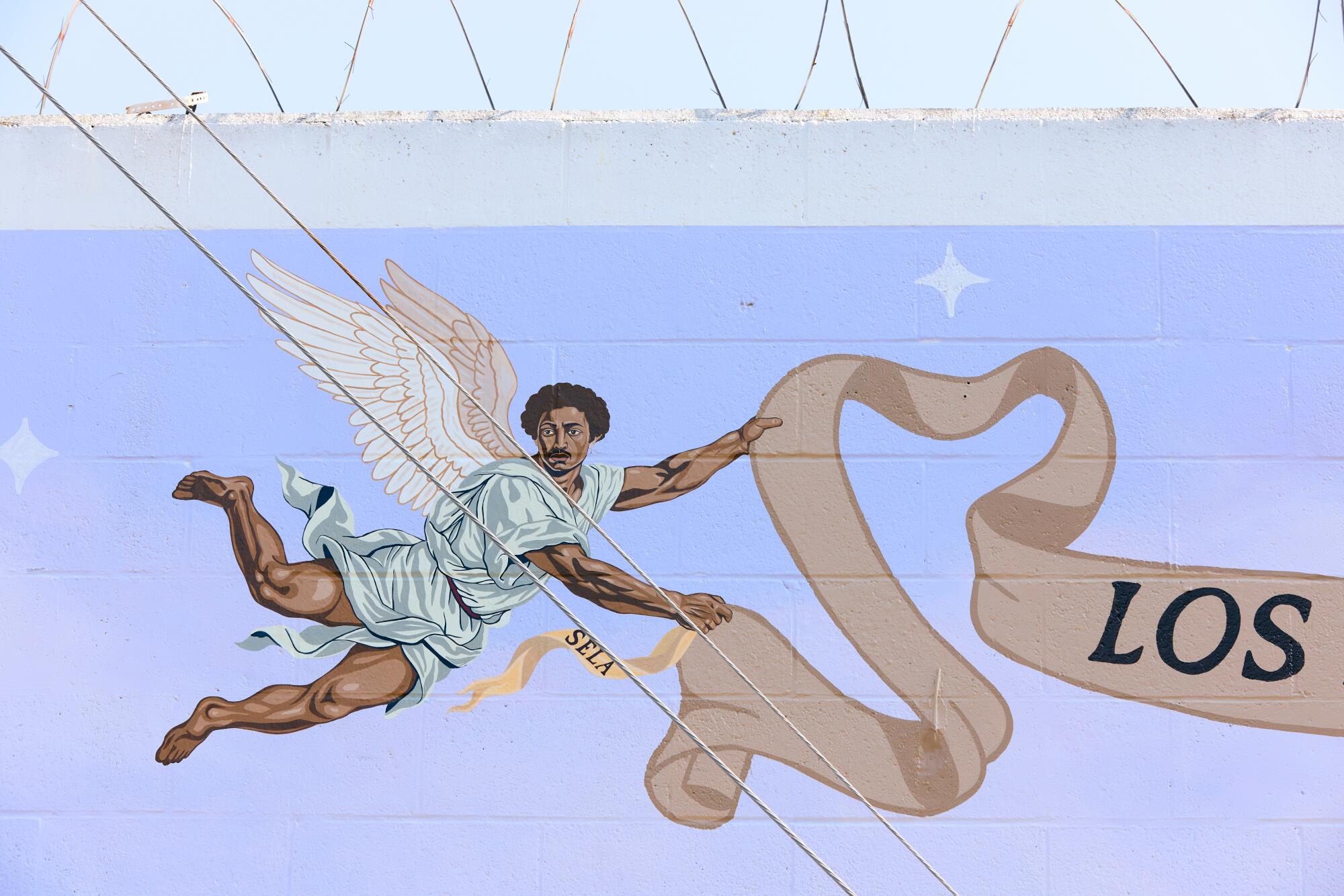 Detail of the first mural of artist, Anthony Lee Pittman, "Los Angelitos" series. Jennelle Fong / For The Times.