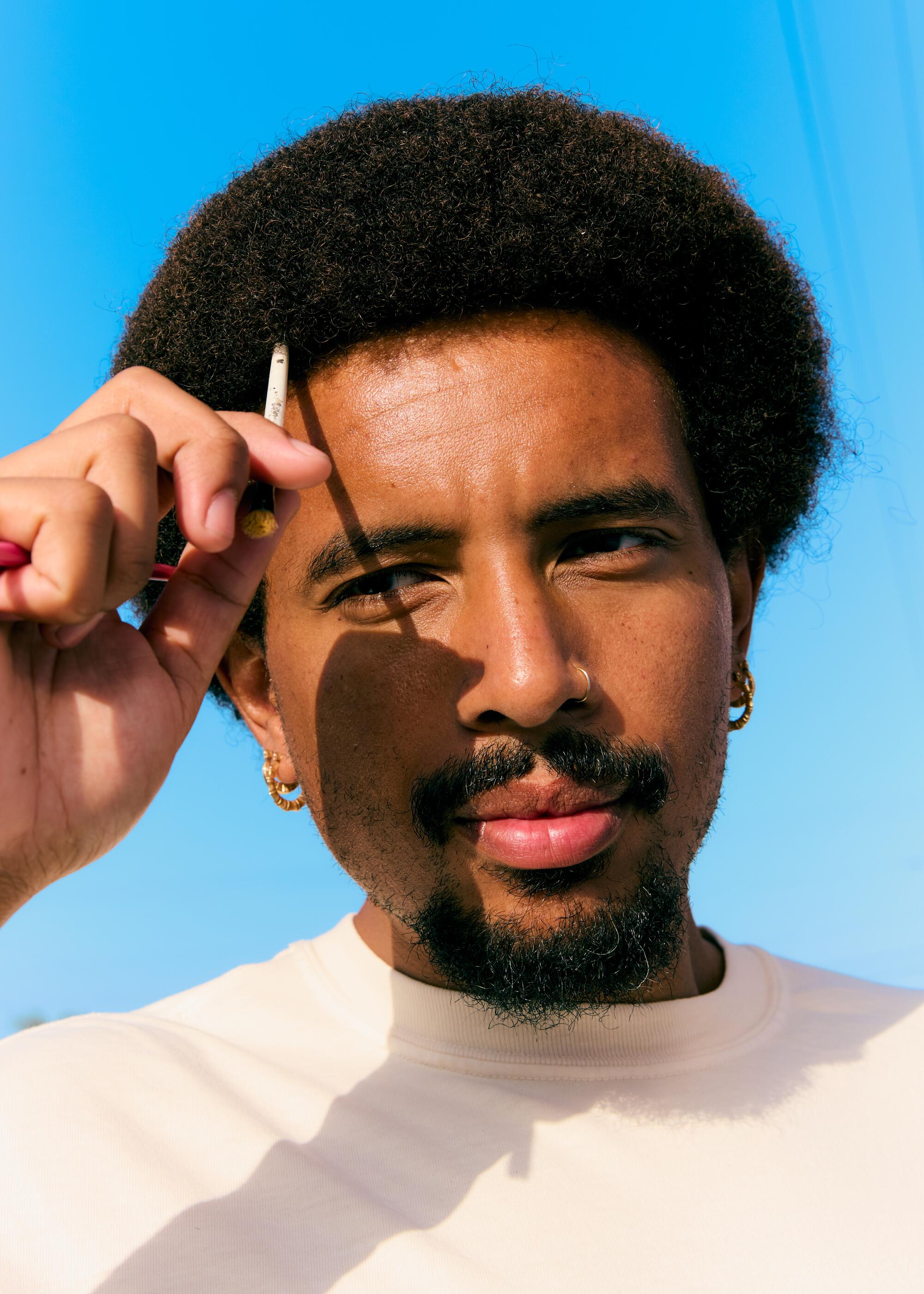Portrait of artist, Anthony Lee Pittman, who created the "Los Angelitos" series. Jennelle Fong / For The Times.