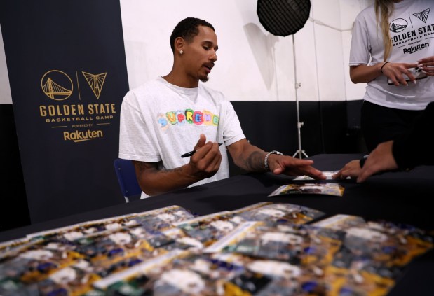 Former Golden State Warriors player and Oakland native Juan Toscano-Anderson signs autographs at the Golden State Sports Academy Basketball Camp at Open Gym Premier in Oakland, Calif., on Tuesday, July 28, 2026. (Jane Tyska/Bay Area News Group)