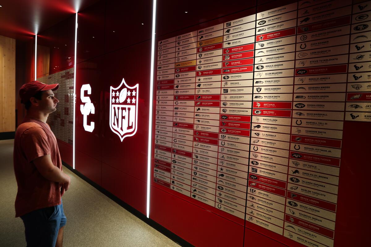 A wall of USC players drafted by NFL teams at the Bloom Football Performance Center.