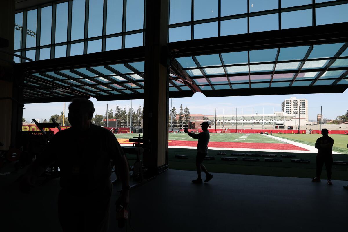 The weight room opens near the practice field.