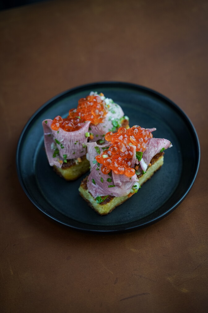 The Tongue & Trout Roe Toast, one of the standout bites on ALTO's new bar menu.