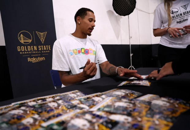 Former Golden State Warriors player and Oakland native Juan Toscano-Anderson signs autographs at the Golden State Sports Academy Basketball Camp at Open Gym Premier in Oakland, Calif., on Tuesday, July 28, 2026. (Jane Tyska/Bay Area News Group)
