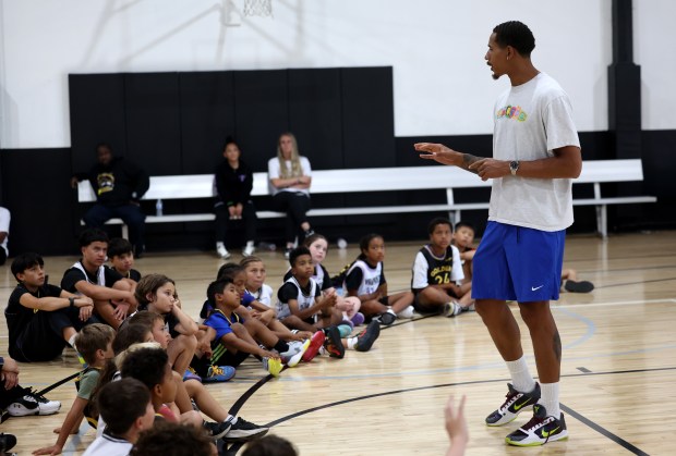 Former Golden State Warriors player and Oakland native Juan Toscano-Anderson talks with youth at the Golden State Sports Academy Basketball Camp at Open Gym Premier in Oakland, Calif., on Tuesday, July 28, 2026. (Jane Tyska/Bay Area News Group)