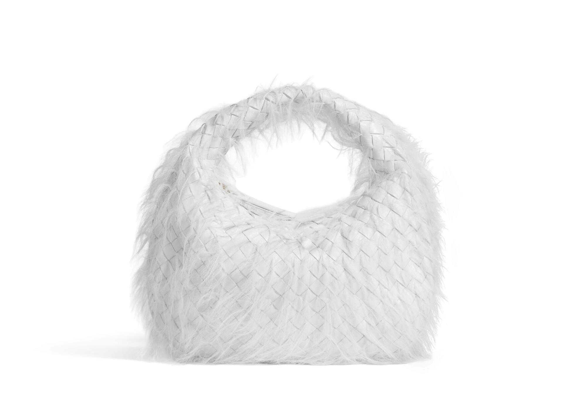 Bottega Veneta, Baby Veneta bag. Coveted selection for Image Magazine's August 2026 Issue.