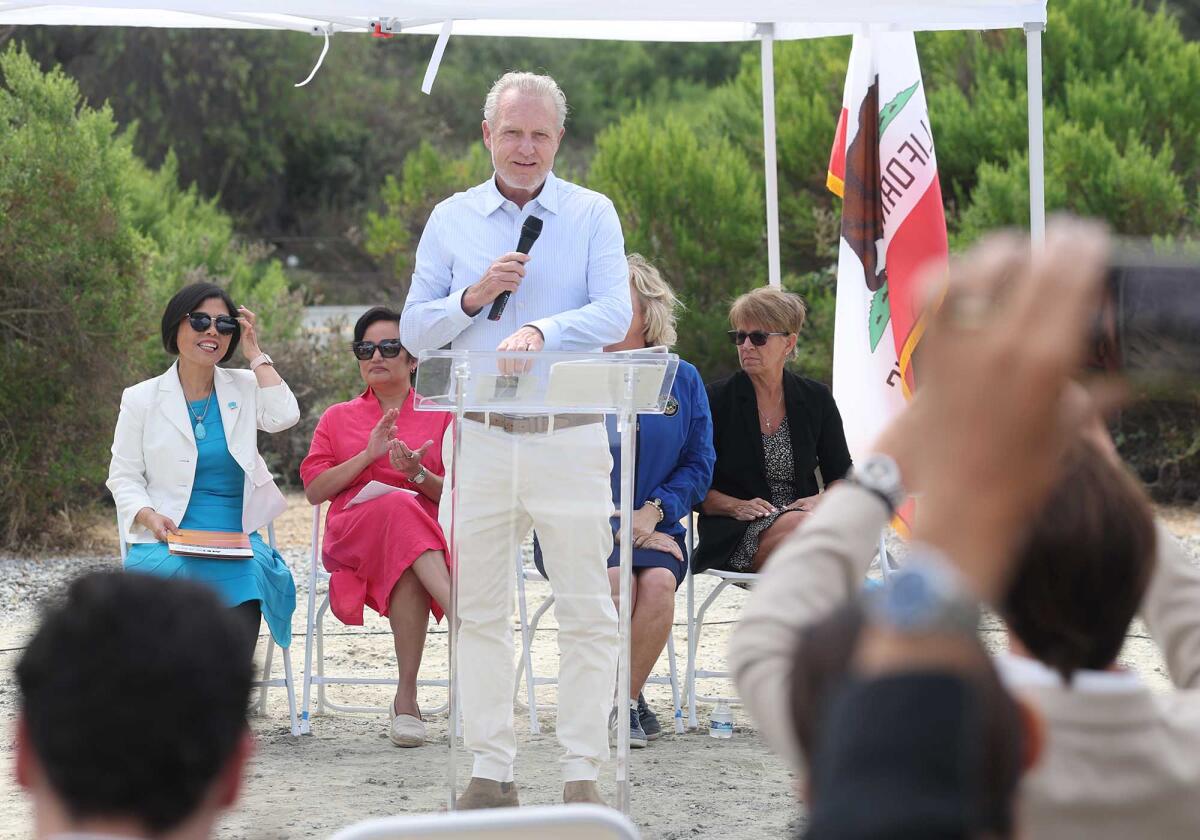 Laguna Beach Mayor Mark Orgill makes comments and thanks partners during a ceremony for Laguna Canyon Road improvements.