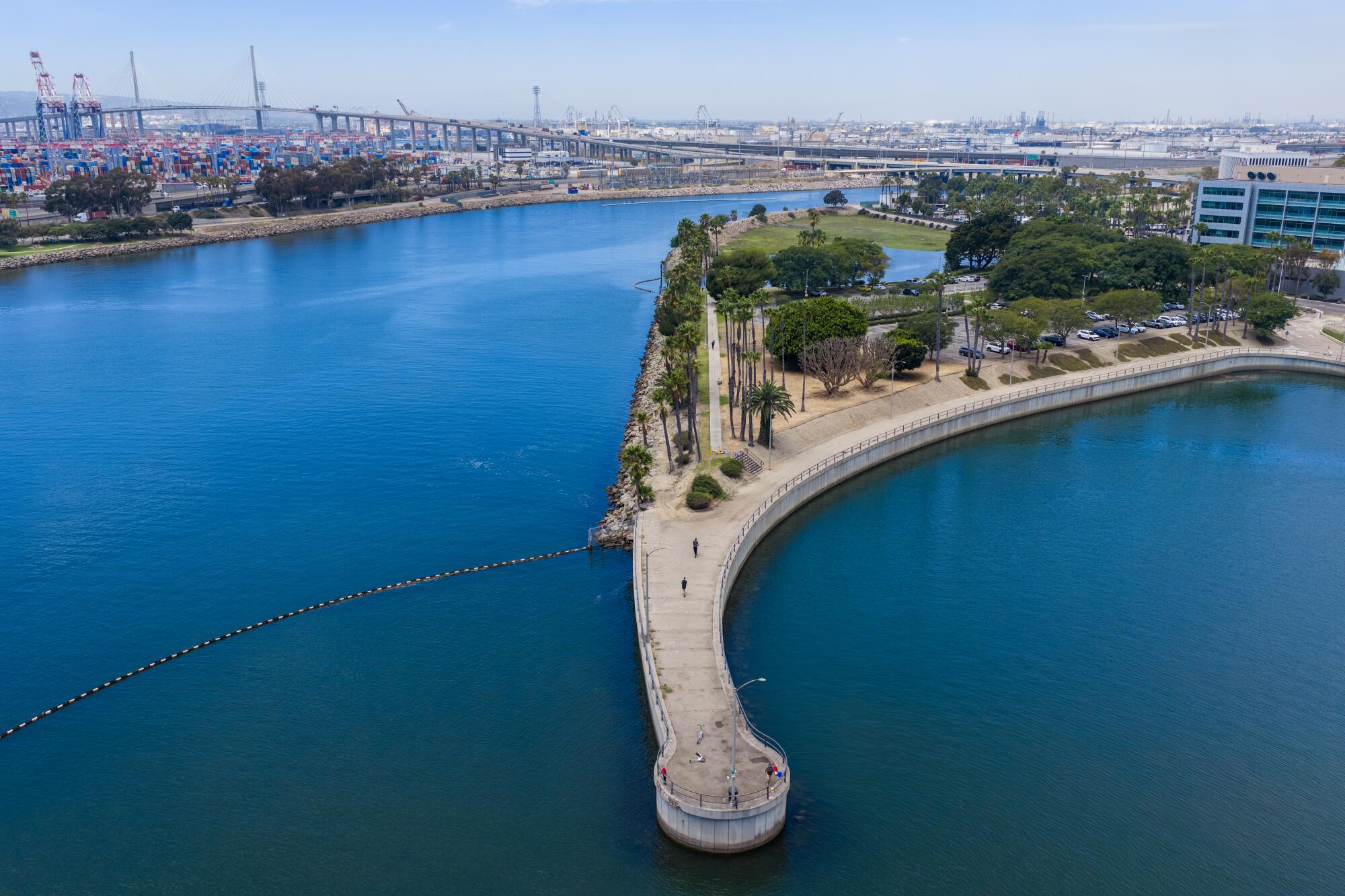 An aerial view of bicyclists riding at the end of the L.A. River Path along the Los Angeles River