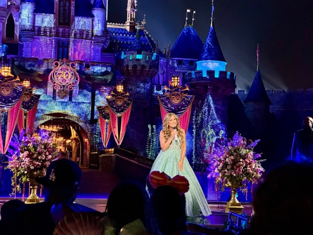 Jodi Benson (voice of Ariel from 1989's "The Little Mermaid") performs during the Disney's World Princess Week concert in front of Sleeping Beauty Castle at Disneyland. (Brady MacDonald/SCNG/Orange County Register)