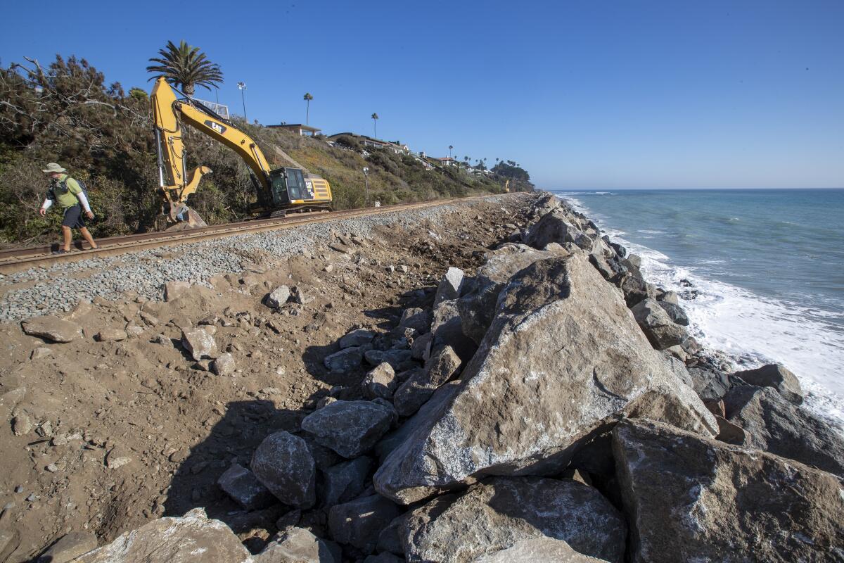Beach erosion forces Metrolink and Amtrak suspended service between Orange and San Diego counties Sept. 21, 2021.