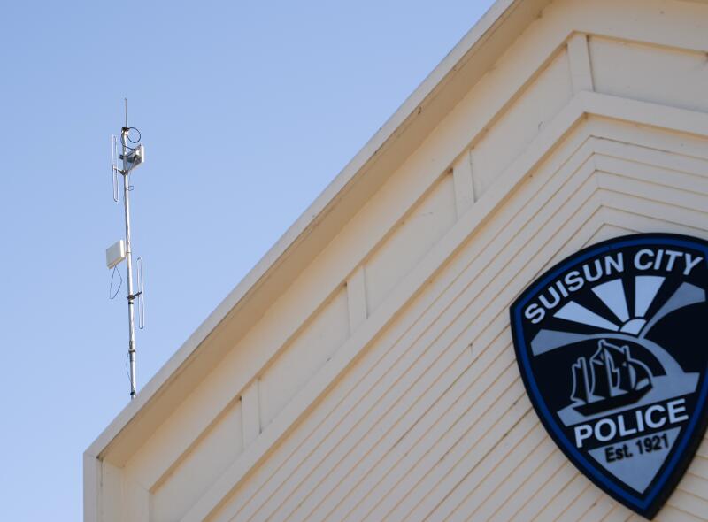 A Suisun City Police sign on the side of the station
