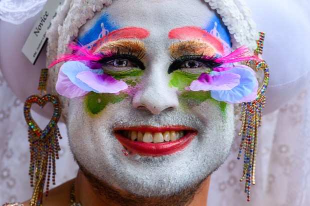 Novice with the Sisters of Perpetual Indulgence smiles while marching during the Oakland Pride Parade in Oakland, Calif., on Sunday, Aug. 16, 2026. (Jose Carlos Fajardo/Bay Area News Group)