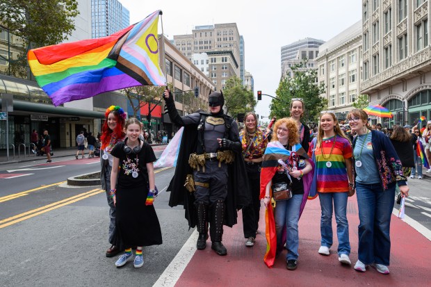 Batman of San Jose marches with parade-goers during the Oakland Pride Parade in Oakland, Calif., on Sunday, Aug. 16, 2026. (Jose Carlos Fajardo/Bay Area News Group)