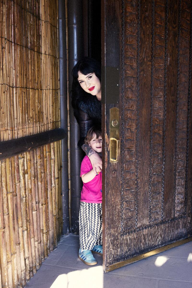Writer Lauren Bethke at one of Damon's green booths, and at the restaurant with her son Damien.