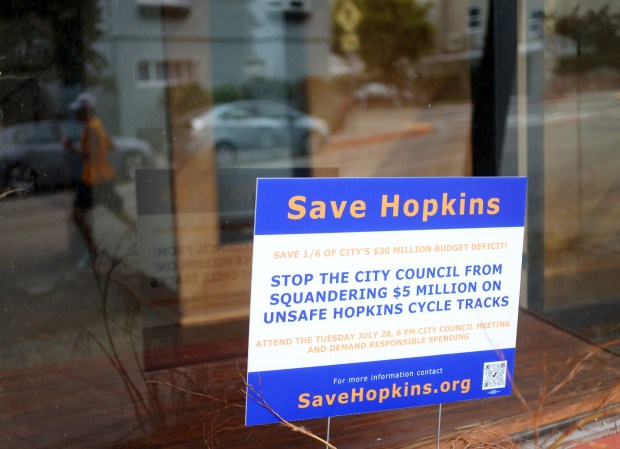 Signage along Hopkins Street on Thursday, Aug. 13, 2026, in Berkeley, Calif. The city of Berkeley is looking at removing over a hundred parking spaces along Hopkins Street for a new bike lane project. (Aric Crabb/Bay Area News Group)