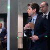 Sam Altman, center, and OpenAI president Greg Brockman, right, arrive at the U.S. District Court in Oakland, Calif., Thursday, April 30, 2026.