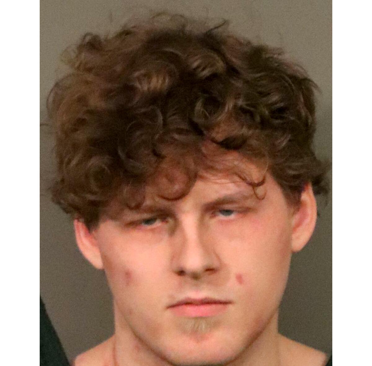 Booking photo of Joseph Naugle, 22