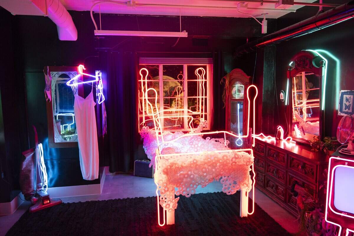 A neon lit art installation is part of the Coordinates: Dispatch pop-up art exhibition located inside the historic fire alarm station at Albert Winn Park in Sacramento on Friday, Aug. 7, 2026.