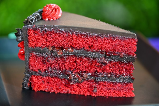 Villainous Red Velvet Cake, a red velvet cake with raspberry jam, chocolate chips and black ganache frosting, available at Plaza Inn on Main Street U.S.A. inside Disneyland. Photographed on Friday, August 21, 2026, in Anaheim. (Photo by Jeff Gritchen, Orange County Register/SCNG)