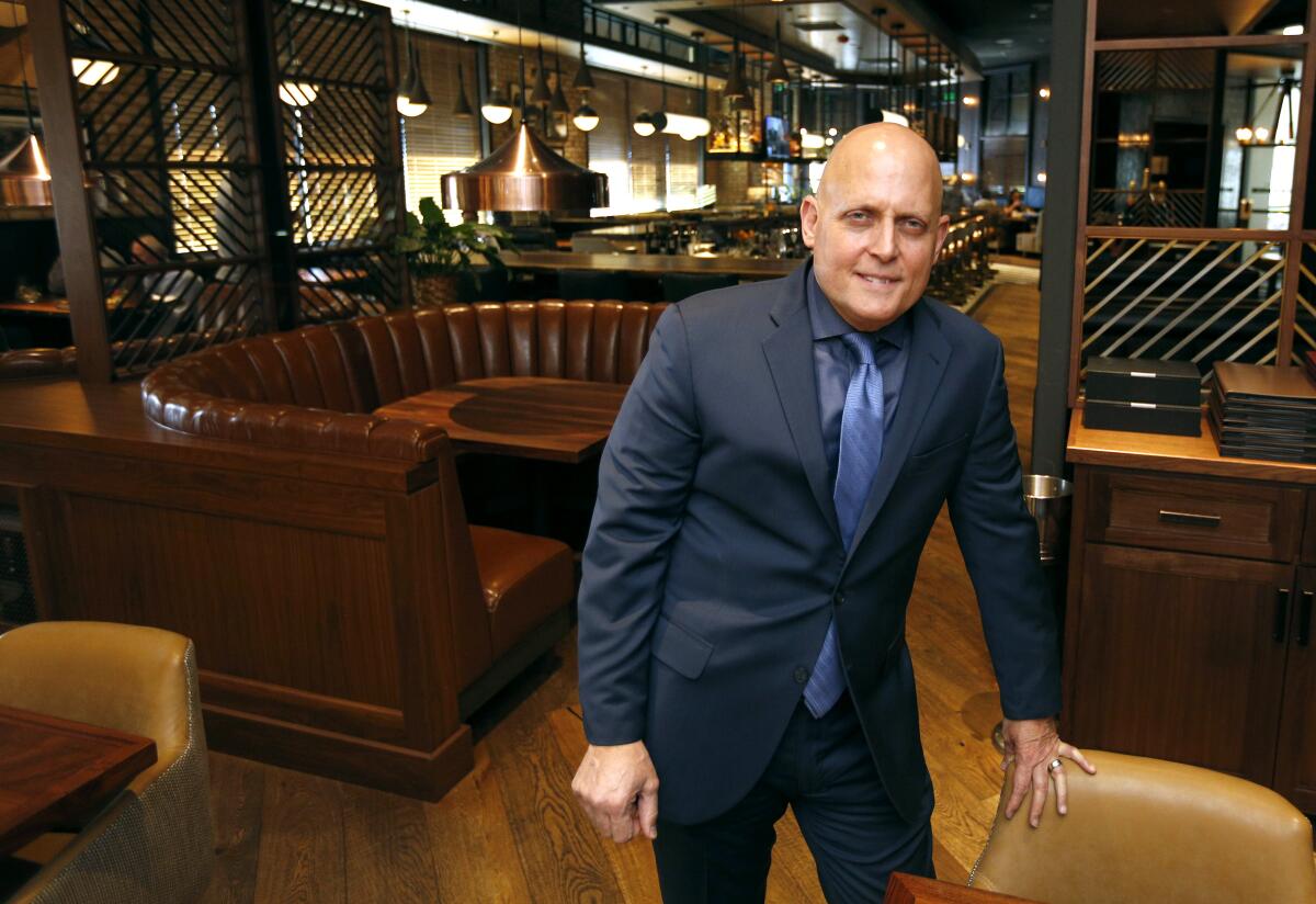 Tony Fasulo in the dinning room of his restaurant, Old Brea Chop House, back in 2020. 