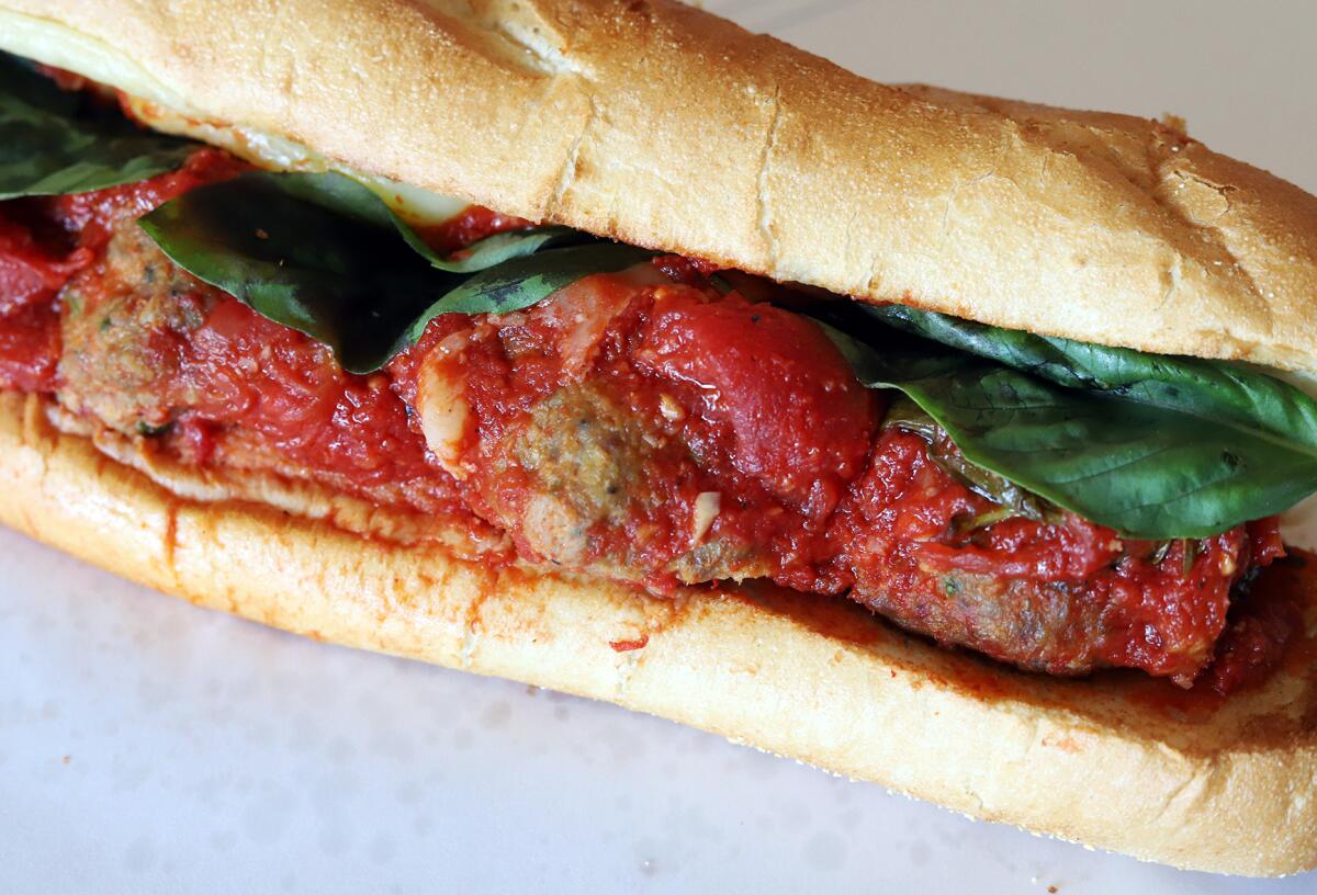 Chef Cut Meat House's veal, pork and beef meatball sandwich with classic marinara sauce in Brea. 