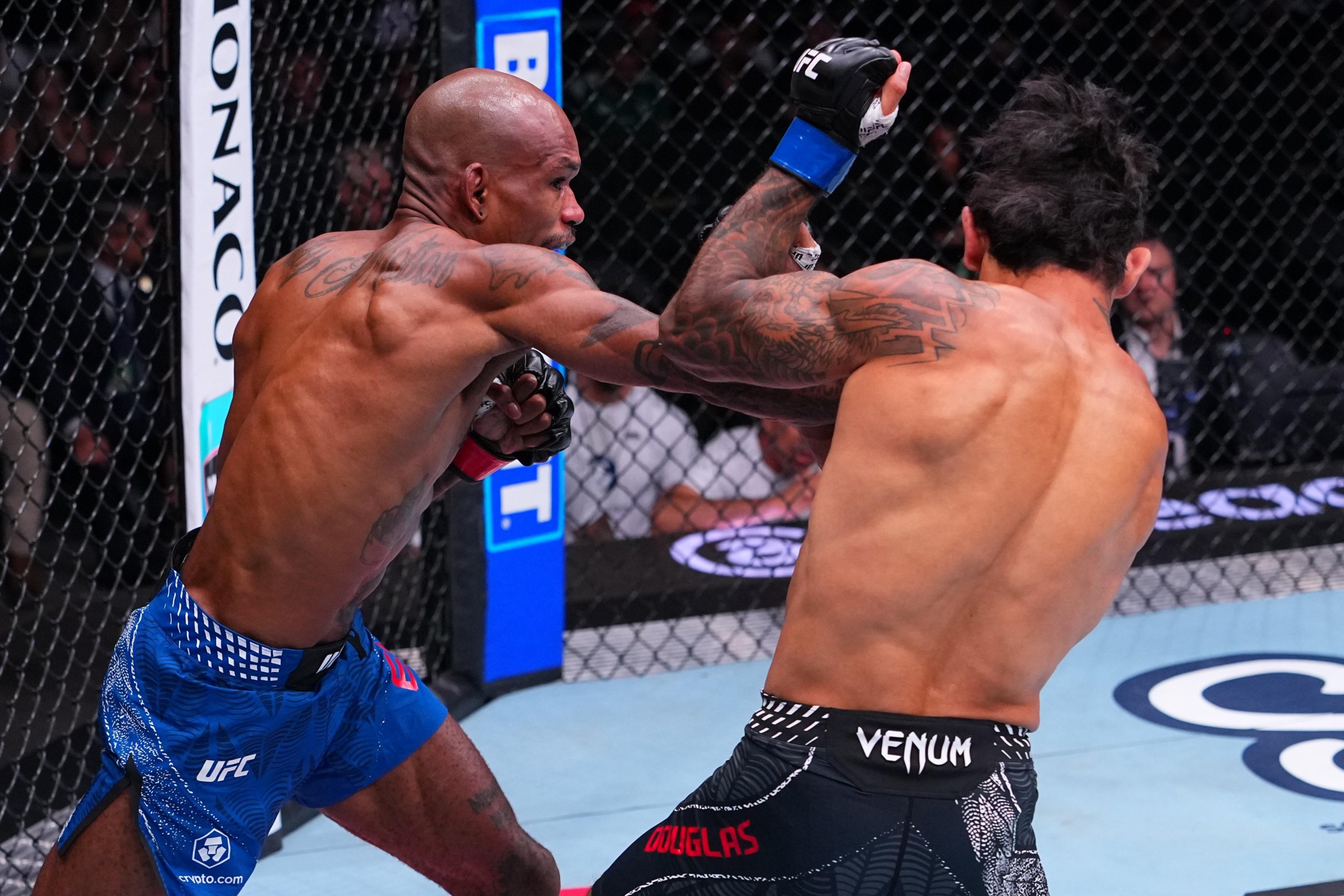 SACRAMENTO, CALIFORNIA - AUGUST 22: (L-R) Jamall Emmers punches Lerryan Douglas of Brazil in a featherweight fight during the UFC Fight Night event at Golden 1 Center on August 22, 2026 in Sacramento, California. (Photo by Jeff Bottari/Zuffa LLC)