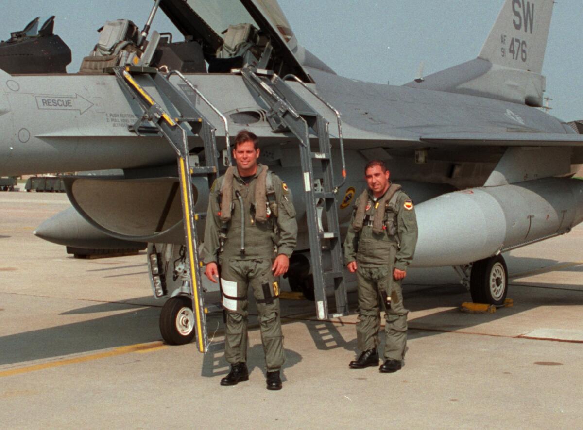 Former Crespi quarterback Captain Randy Redell (left) and sportswriter Eric Sondheimer in 1998.


