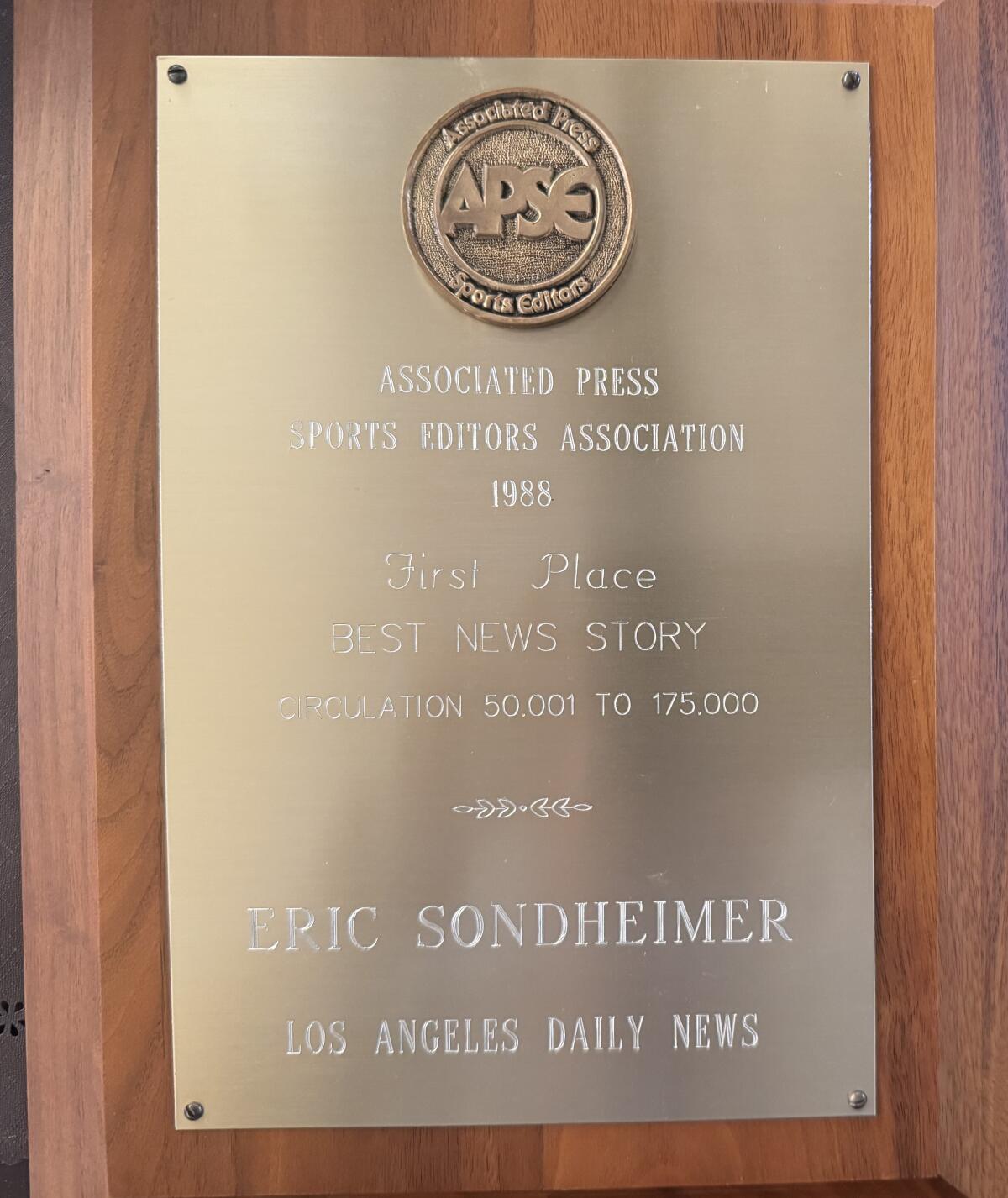 Associated Press Sports Editors award in 1988 for Eric Sondheimer story on Kentucky basketball recruit.